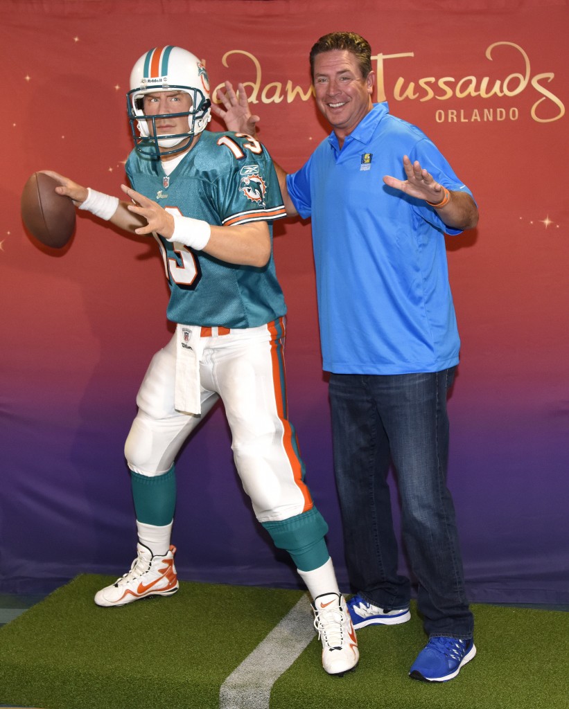 Dan Marino poses with his wax figure